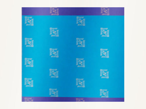 Close detail of the turquoise body fabric showing silver-toned woven floral motifs in geometric frames.