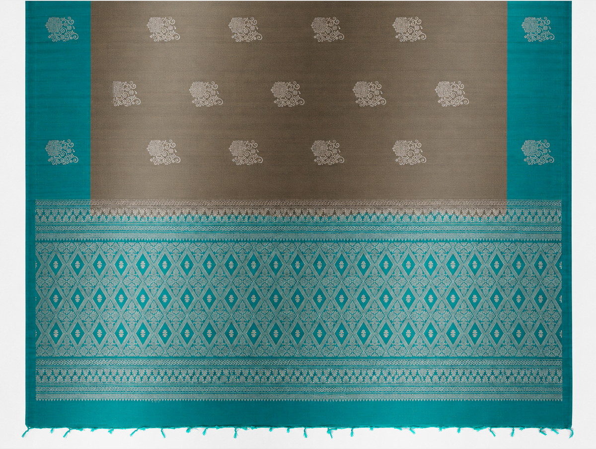 Kayal antique bronze and turquoise pure silk saree showing silver medallion body and diamond-woven pallu