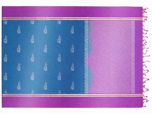 Full product view of the Neela pure silk saree showing its royal-blue body, orchid-magenta purple borders, silver woven sprigs, geometric pallu and tassels.