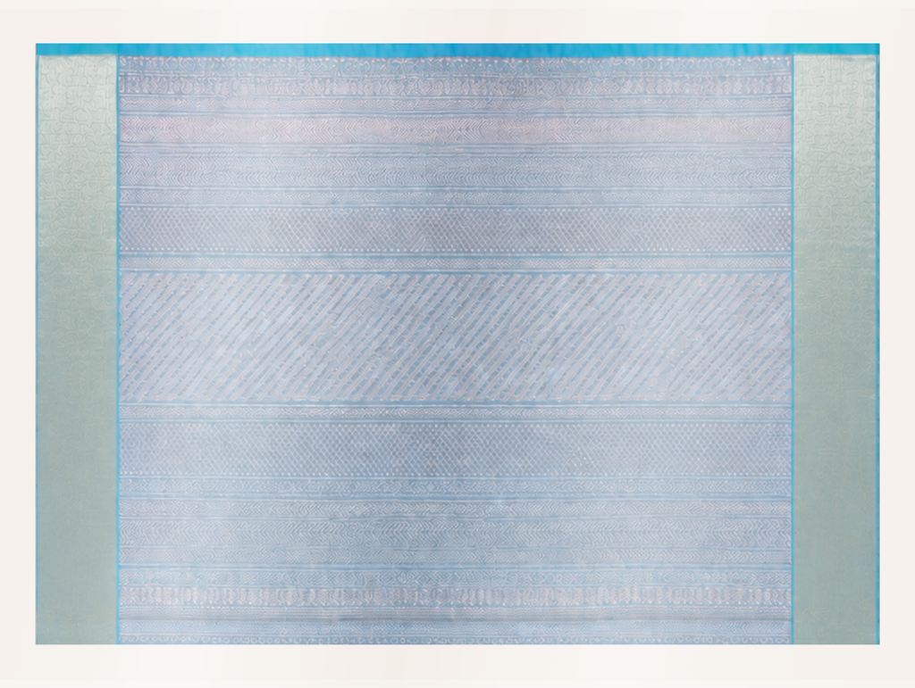 Close view of the ice blue and silver pallu with diamonds chevrons herringbone and fine geometric linework