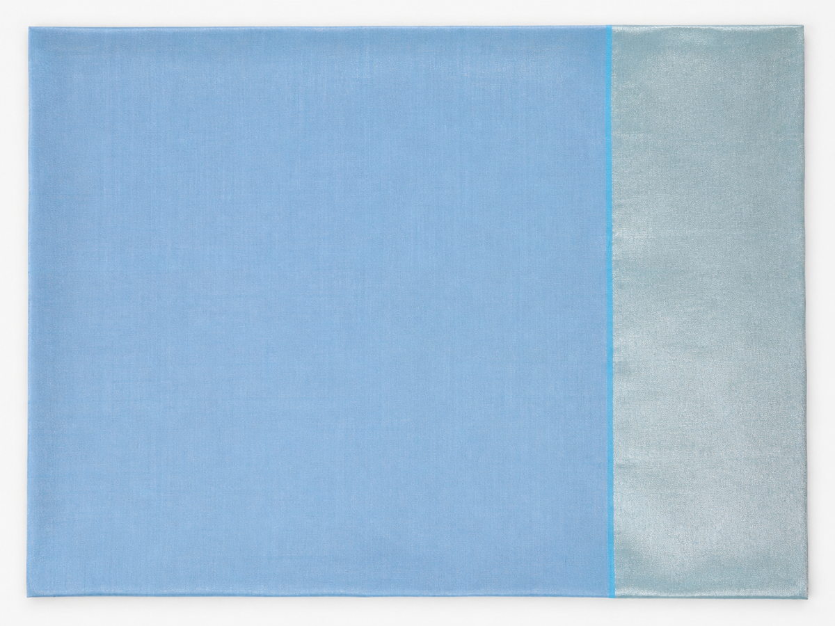Matching ice blue unstitched blouse piece with pale silver woven border
