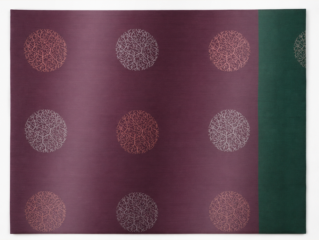 Thulasi deep plum pure silk saree body with alternating silver and copper circular branch medallions and emerald border