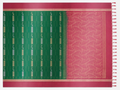 Full flat-lay view of the Vanya saree showing its emerald-green woven body, dusty-rose border and contrasting fan-woven pallu.